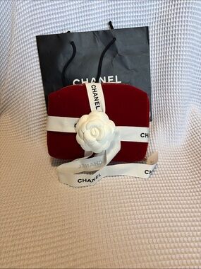 CHANEL Red Velvet Pouch with White Camellia Accent
